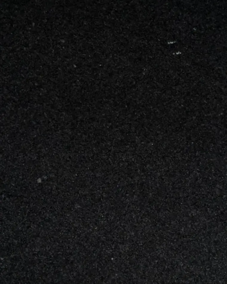 Close-up visual reference of fine-grained black quartz